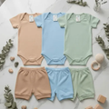 Imagem da oferta Kit 3 Conjuntos Bebê Algodão Body Manga Curta + Shorts Macio
