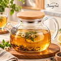 Imagem da oferta Bule Chaleira de Vidro Borossilicato 800ml com Tampa de Bambu e Filtro Infusor Inox para Chá Café Água Quente - Nany Pink
