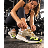 Imagem da oferta Tênis Fila Speedzone Racer Feminino Corrida Caminhada Treino Douradopretoverde Limao Geométrico 39 Br