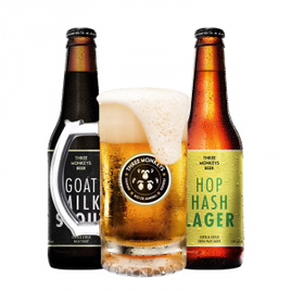 Imagem da oferta Kit de Cervejas Three Monkeys: Beer Goat Milk Stout 355ml +  Beer Hop Hash Lager 355ml + Caneca Exclusiva