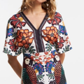 Imagem da oferta Vestido em Malha de Viscose com Decote Detalhado e Estampa Tropical